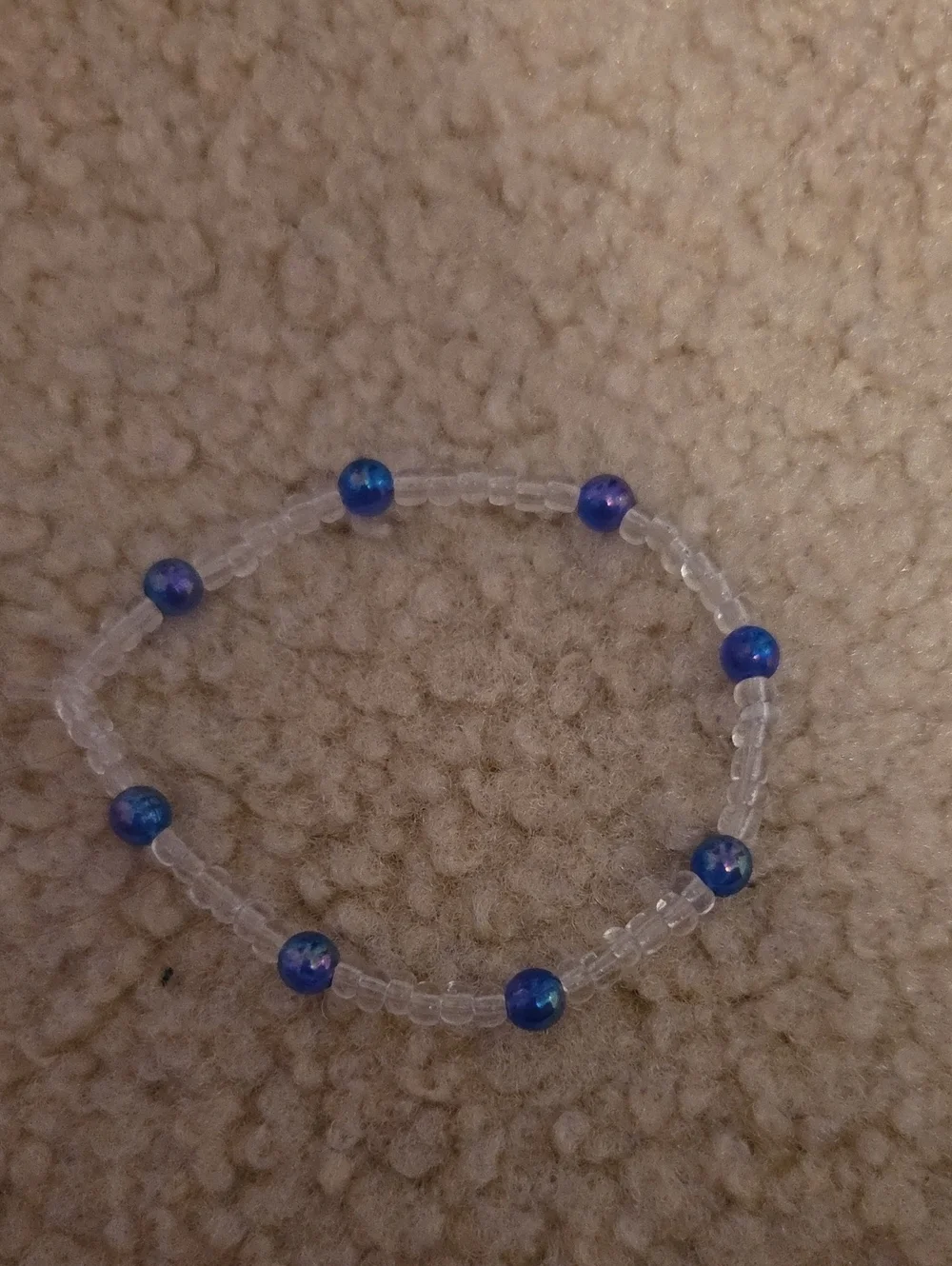Clear Seed Bead Bracelet with Iridescent Blue Accents